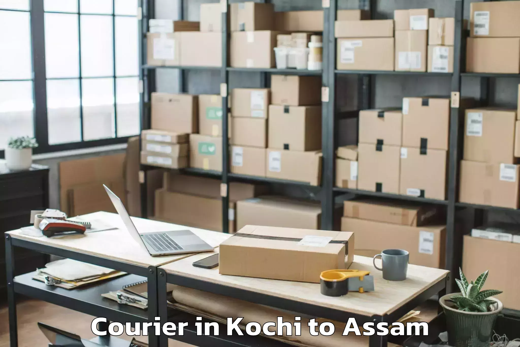 Reliable Kochi to Raha Courier